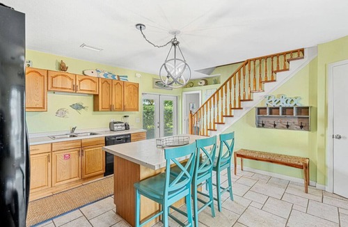Cocoa Beach House | TIKI BLUE TWO: Family-sized beach house. Walk to Beach. Heated Pool & Hot Tub.