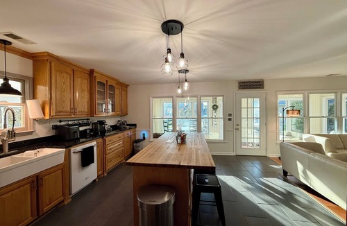 Cross House | TIME TO RELAX with this direct waterfront home with private dock and ramp