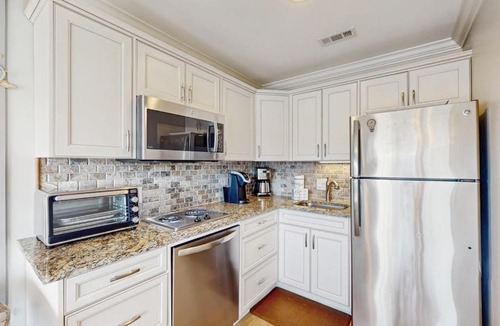 North Forest Beach House | Top Floor Condo with Ocean Views Pool Balcony & WIFI - Walk to Beach