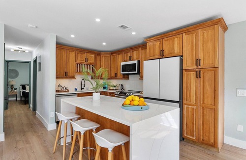 River Oaks House | Tranquil Oasis: Newly Renovated Villa, Heated Pool, Private Garden Retreat
