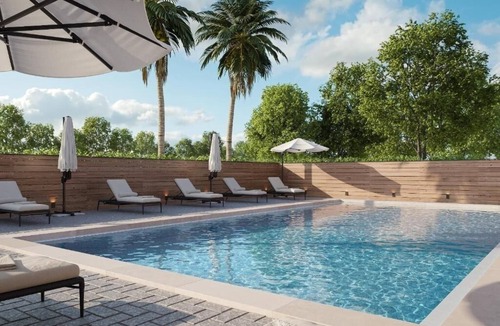 Kissimmee Hotel | Tranquil Pool-View Room for Family Escapes Near Disney Parks