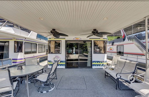 Smithville Boat Rental | Tranquil Waterside Escape: TALES Premier Houseboat Rental on Center Hill Lake