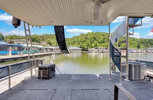Smithville Boat Rental | Tranquil Waterside Escape: TALES Premier Houseboat Rental on Center Hill Lake