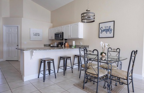 Lake Berkley Villa | Tropical Boho Lakefront Villa | Private Pool & Spa | Game Room | Near Disney