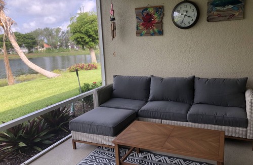 Trafalgar House | Tropical gated community lake front house Sandoval Cape Coral Pet Friendly.