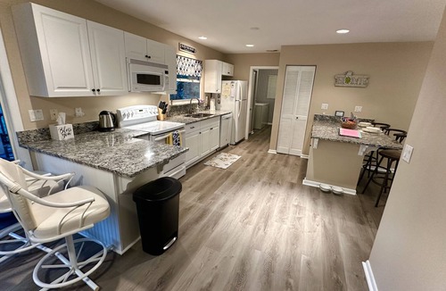 Vero Beach House | "Tropical Getaway" Peaceful, cozy, clean 3-2 home. Inviting back porch w swing.