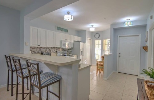 Ole Condo | Tropical Retreat w/Heated Pool in Coral Falls