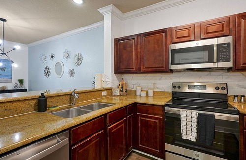 Reunion Apartment | Tuscana Resort with pool 9mi from Disney. No resort fees and two bedroom suites!