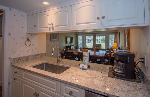 Saint Helena Island Condo | Two-Story Condo with Private Deck, WiFi, & Courtyard Pool Access