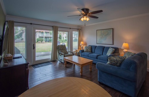 Saint Helena Island Condo | Two-Story Condo with Private Deck, WiFi, & Courtyard Pool Access