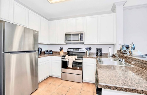 West Kissimmee Condo | Upstay | Disney Area Condo w Pool Pet Friendly