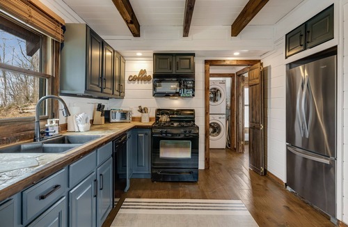 Royal Pines Cabin | Views in the Blues: 3-Story Asheville Log Cabin with Hot Tub & Fire Pit