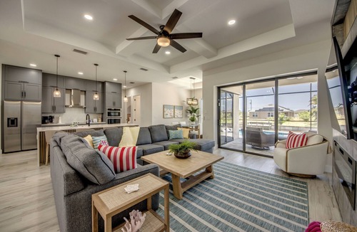 Trafalgar Villa | Villa Paradise - Exquisite 3 Bedroom/3 bath waterfront Villa with heated pool, guest suite, fishing poles