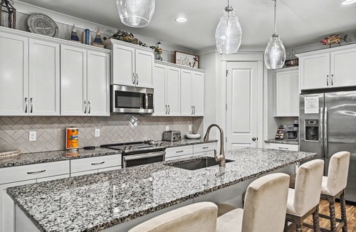 Folly Field House | Walk to Beach, Perfect for Multi-Family, Free Heated Pool, Spa, 3D Theater, Arcades (83 Sandcastle)
