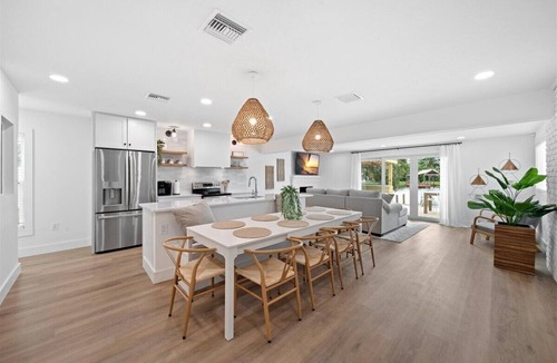 Cocoa Isles House | Walk to beach, riverfront, pool home. Bring your boat!