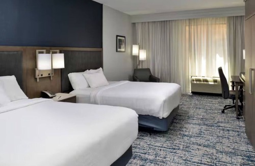 Downtown Wilmington Hotel | Walk to Riverwalk & Battleship! Pool, Gym, and Bistro Bar Access | 2 Units