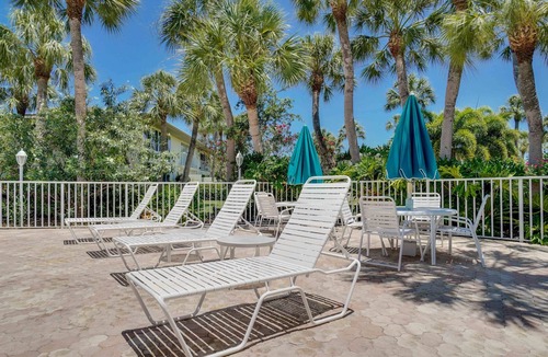 Whitney Beach Condo | Watch Manatees outside your Window only Steps to the Beach and Pool.