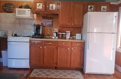 Vonore Cottage | Water front cottage w/water access, firepit & great sunsets.