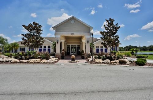 Trafalgar Village House | Water view retreat with lanai, heated pool, pool spa, game room, & AC