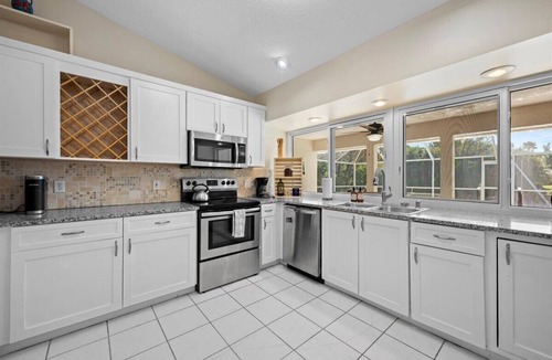 Port Saint Lucie House | Waterfront 3/2 Pool Home - PSL with Boat Lift