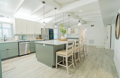 Riviera Bay House | Waterfront Canal Retreat Pool, Dock, 10 Min to DTSP Sleeps 8