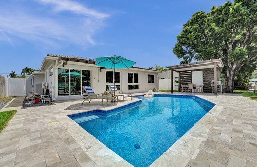 Citrus Isles House | Waterfront luxury pool home near FLL Airport.