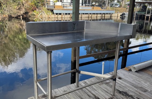 Fedhaven House | Waterfront property on Lake Hatchineha with a boat lift