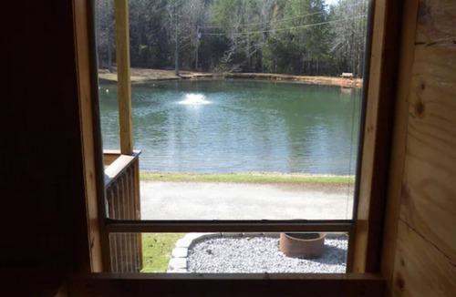Roebuck RV Rental | Waterfront Tiny House at Pine Ridge Campground. More info in description.