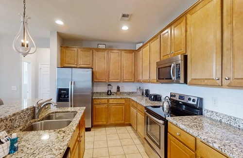 Forestbrook House | Waterway home with enclosed yard on cul de sac