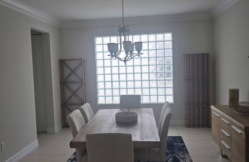 Jog Road House | Welcome to 8477 Breezy Hill Drive — Your Private Home Away From Home