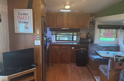 Fort Pierce House | Welcome to the pink, cozy camper, minutes to the beach. The best of both worlds.
