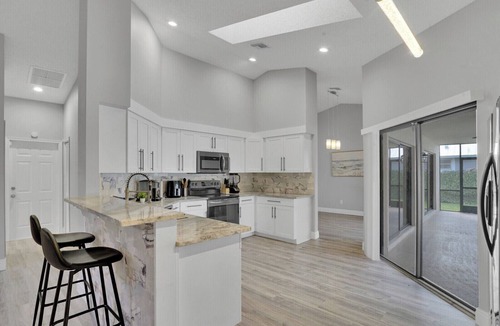 Wellington House | Wellington Pool Home Near WEF 4BR Heated Pool Sleeps 8+