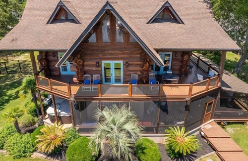 Manning House | Wyboo Lakefront Premier: Log Cabin on the Water!