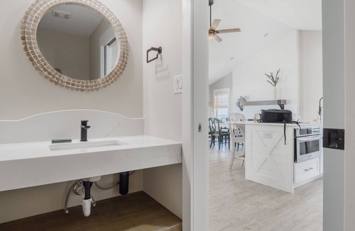 Village of Stump Sound House | Wynd Swept # 111 Oceanfront House, Pool, Tennis courts, kayak launch!