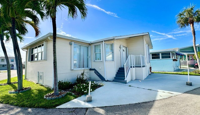 2-bedroom, 2-bathroom home is situated on a prime corner lot