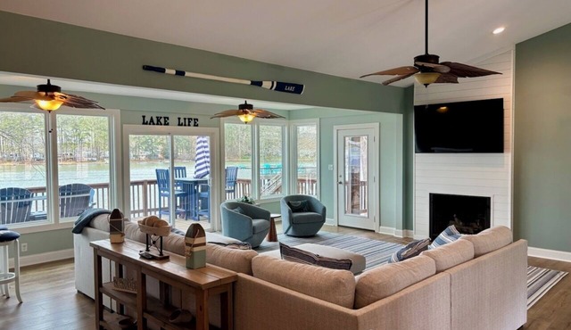 7-bedrm, 5-bath home on 168' of open shoreline on a wide, deep-water cove.