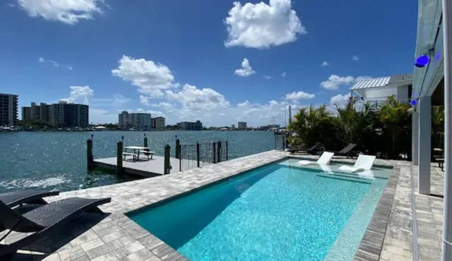 Beach House on the water with dock, pool & everything to enjoy the beach life.
