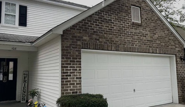 Breezy 5-Bed Home with Walk-In Closets, Fenced Yard, Lagoon View, and Utilities