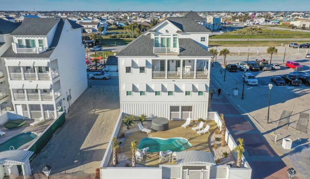 Captains Choice , is a beachfront 5 bdrm/5.5bth vacation home right on Atlantic Beach. Enjoy spacious living, a fully equipped kitchen, stunning ocean views, private pool & hot tub. Walk to food, drinks & music. Off-season pool heating avail.