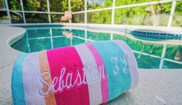 Come Home to Paradise…. Screened in pool with covered lanai and hot tub