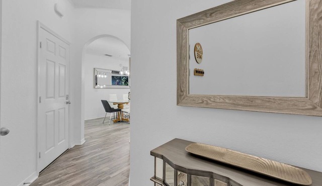 Cozy 2-bedroom condo in welcoming Kissimmee with AC and gym access
