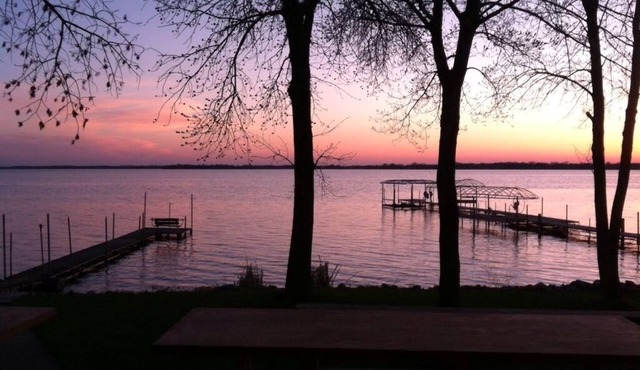 Dream sunsets from this two bedroom lakeside cabin in Osakis