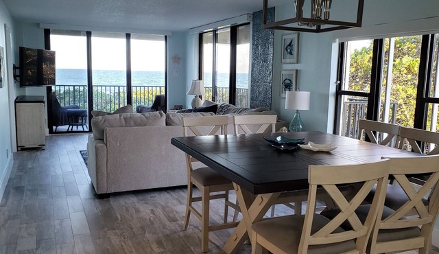 Escape to your HAPPY place, luxury corner condo right on the beach!