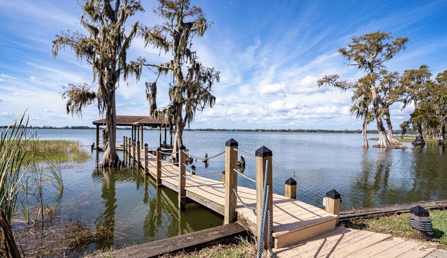 Expansive Lakeside Living at this Sunset Haven Gem
