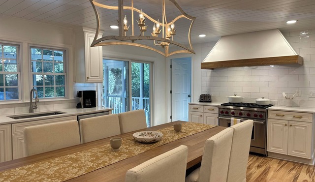 Golf course home in Raintree Country Club. Outdoor oasis with pool and hot tub.