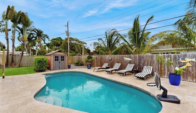 Inviting villa with heated saltwater pool & tropical backyard oasis