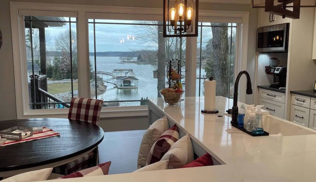 Lakefront home with private beach & gourmet kitchen