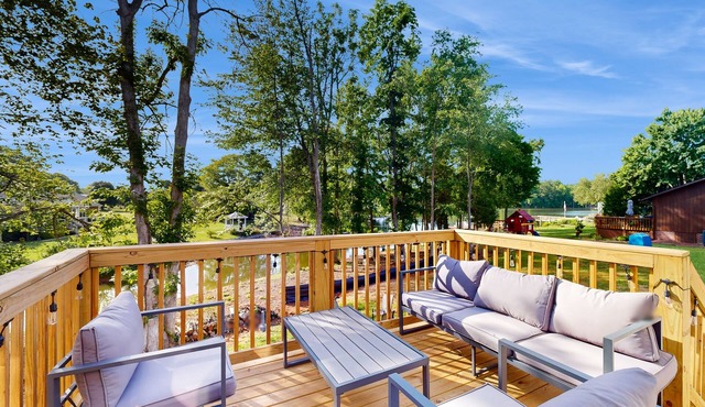 Lakefront retreat with furnished deck, dock, firepit, washer/dryer, & AC