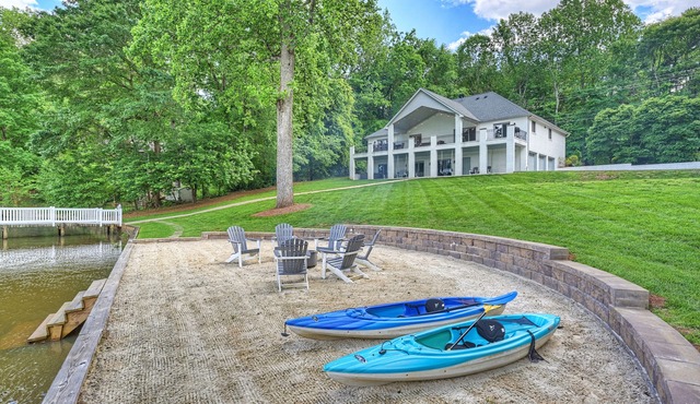 Luxe Lakefront Estate with Private Beach + Firepit + Dock + Hot Tub