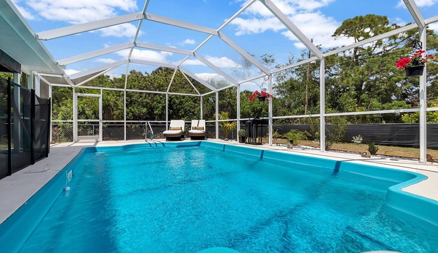 Luxury Oasis - heated & gated pool, relaxing modern home sleeps 8. Best location